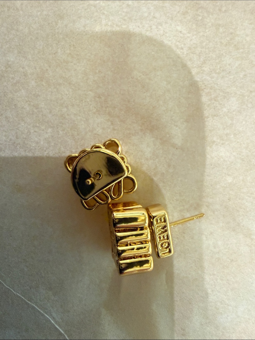 Gold Tone Ribbed Logo Stud Earrings - Picture 6 of 6